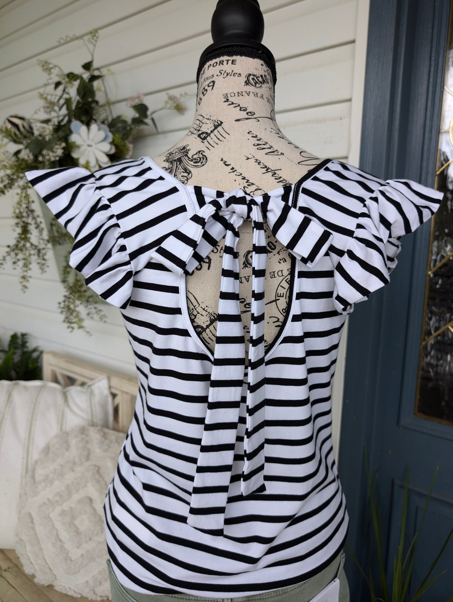 Ruffle sleeve tie back striped top