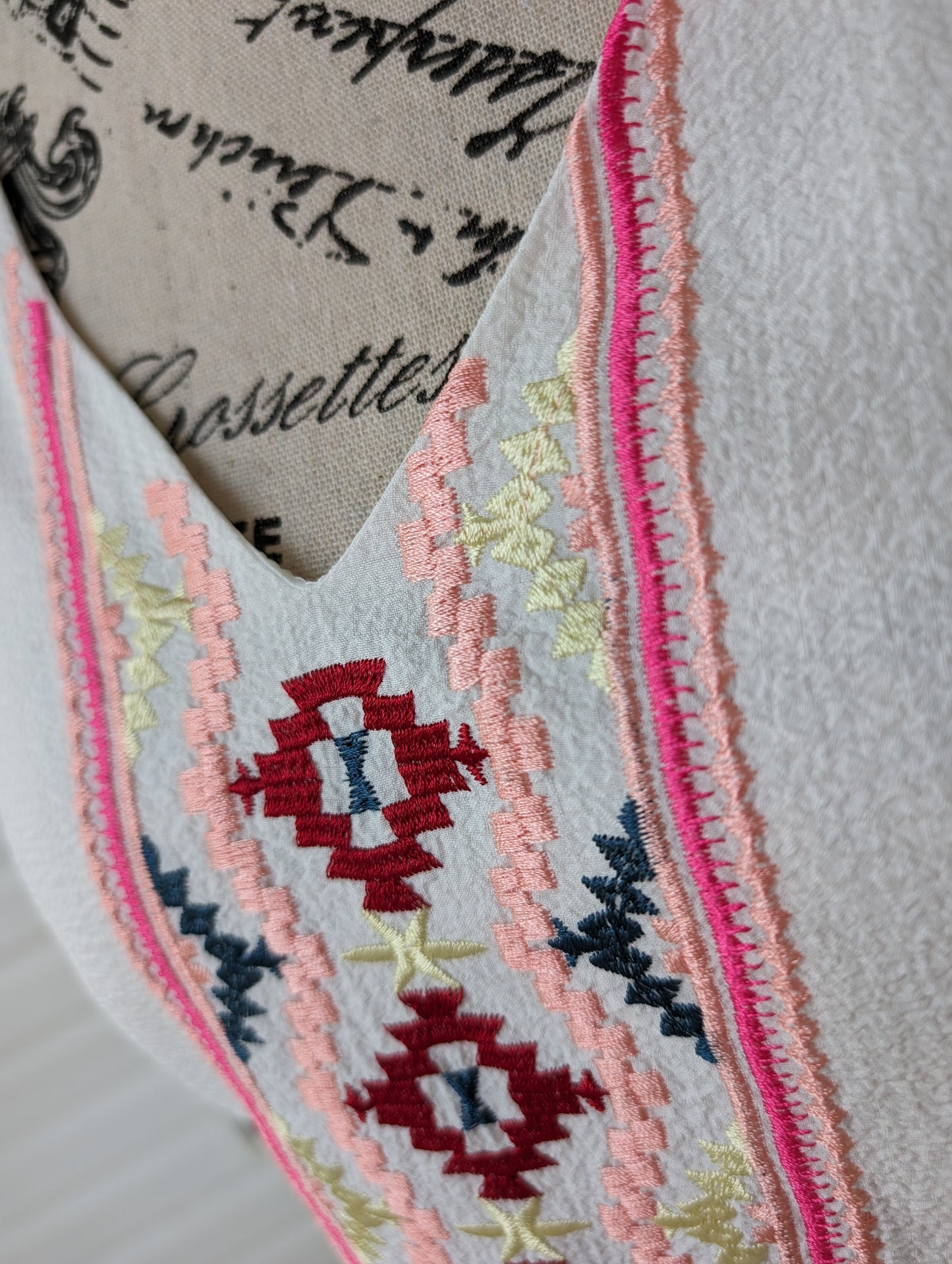 Embroidered sleeveless top