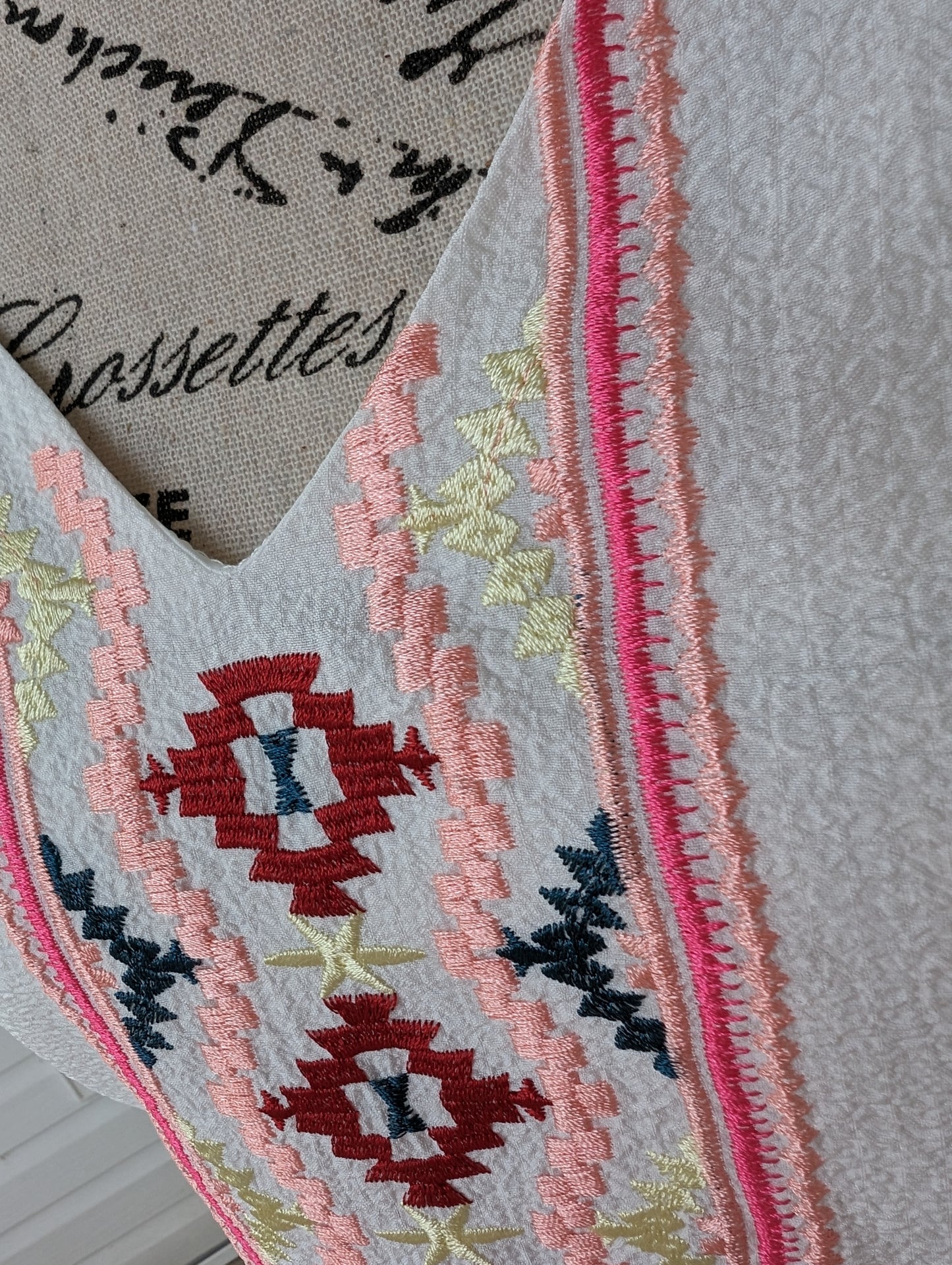 Embroidered sleeveless top
