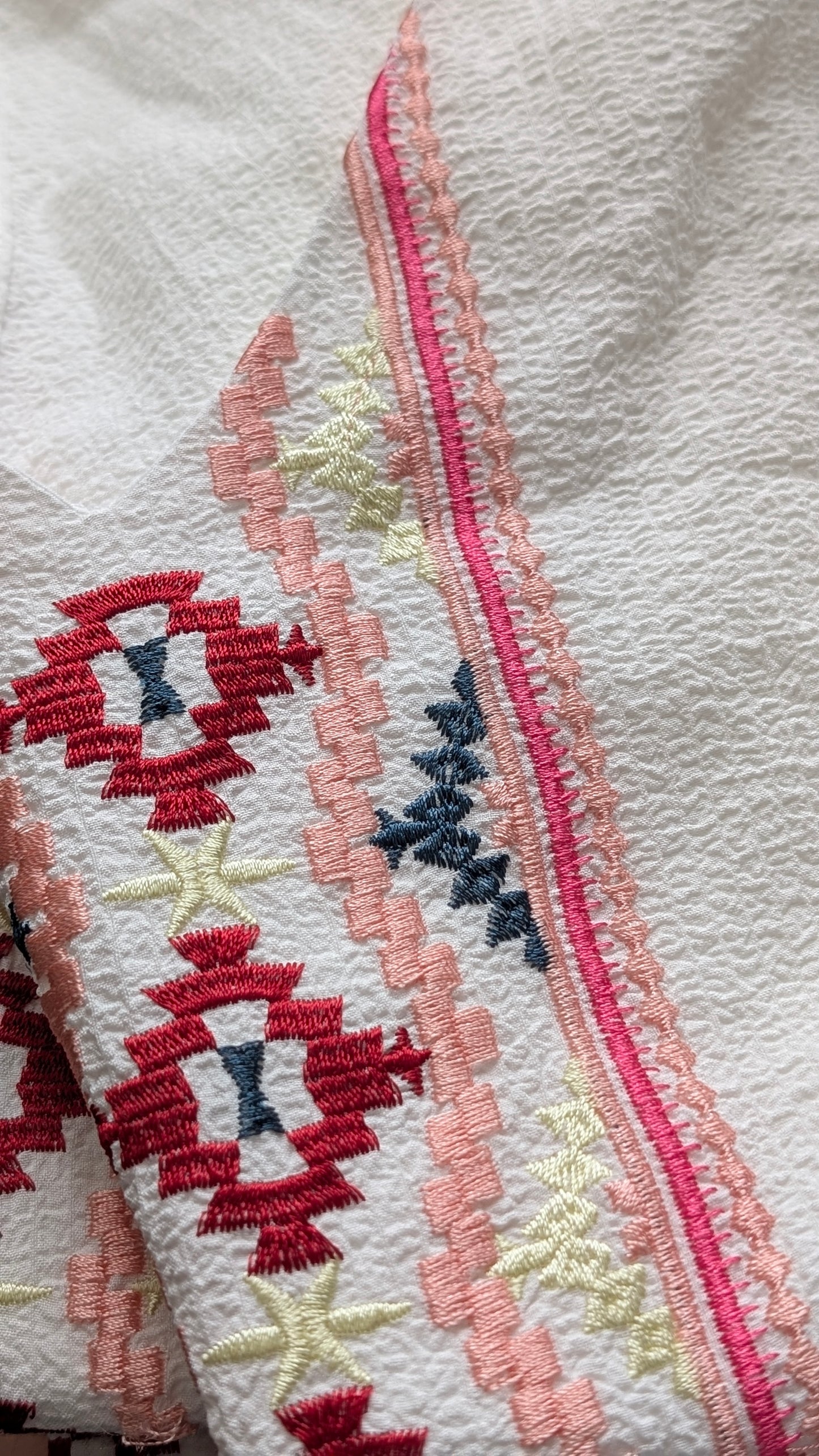 Embroidered sleeveless top